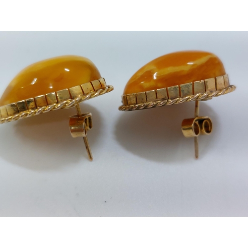 245 - Amber and unmarked gold coloured earrings