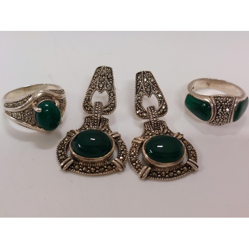 248 - Silver and marcasite rings with green stones,  approx sizes M and size N, stamped 925 with a pair of... 