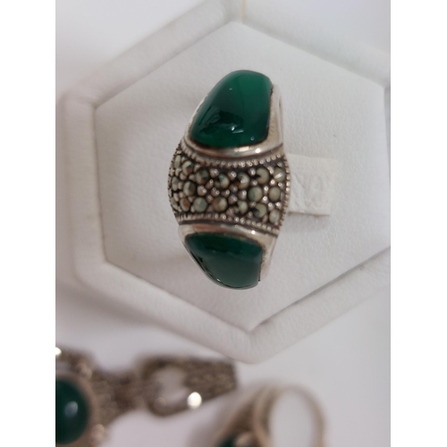 248 - Silver and marcasite rings with green stones,  approx sizes M and size N, stamped 925 with a pair of... 