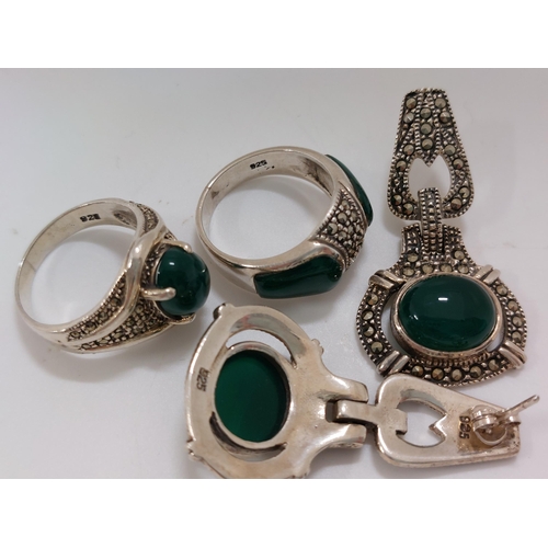 248 - Silver and marcasite rings with green stones,  approx sizes M and size N, stamped 925 with a pair of... 