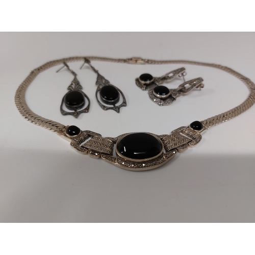 249 - Marcasite and silver jewellery items consisting of a snake chain designed necklace with black centra... 