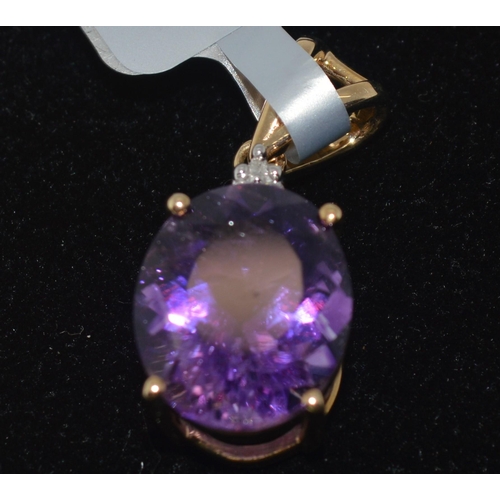 49 - X2 amethyst gem stones pendants set in gold mounts marked 417 TGGC