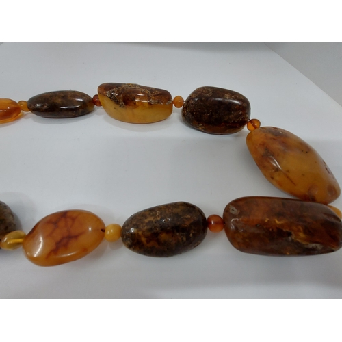 54 - Rare Baltic/cognac amber necklace, approx size of largest piece 6cm, approx gross weight 215g