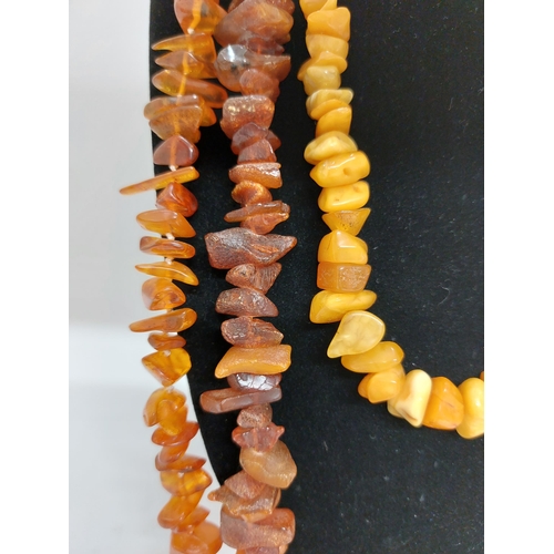 60 - Three amber large chip necklaces, approx gross weight 150g