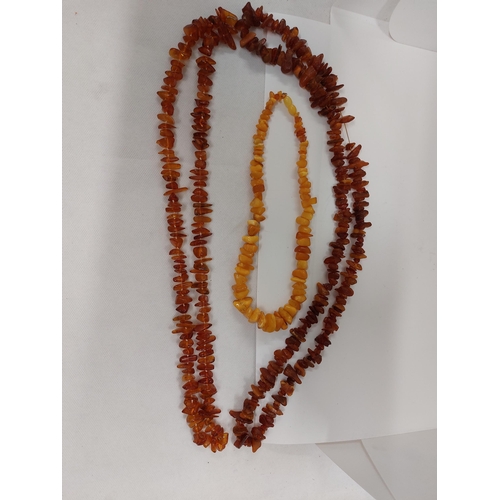 60 - Three amber large chip necklaces, approx gross weight 150g