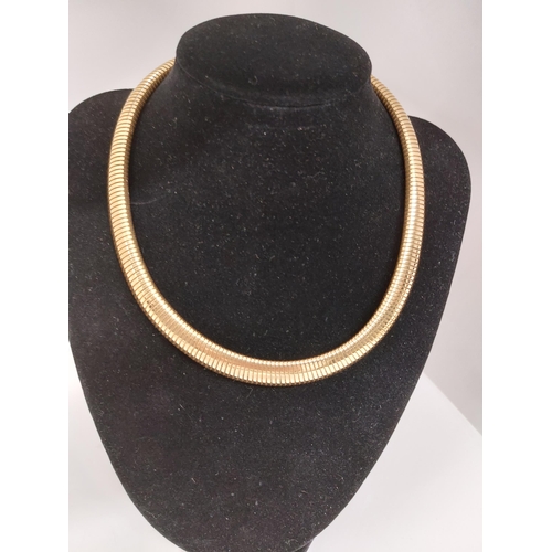 62 - Christian Dior gold tone necklace in a chocker design