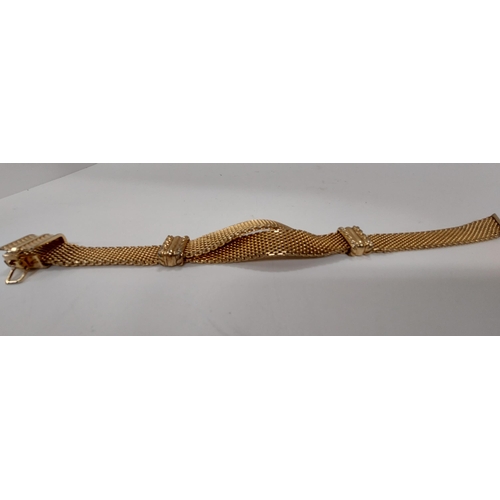 63 - Christian Dior gold tone twist design bracelet