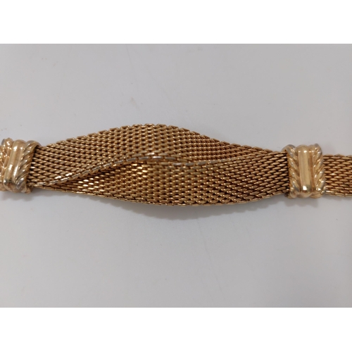 63 - Christian Dior gold tone twist design bracelet