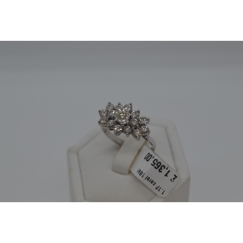 114 - 18ct white gold approx 1.10ct diamond cluster ring, Radiating oval splayed cluster design from centr... 