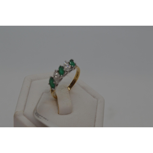 172 - 18ct yellow gold marquise cut five stone emerald and diamond ring. Approx  E0.75ct, D0.50ct. Hallmar... 