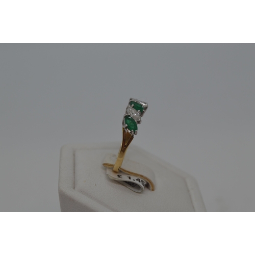 172 - 18ct yellow gold marquise cut five stone emerald and diamond ring. Approx  E0.75ct, D0.50ct. Hallmar... 