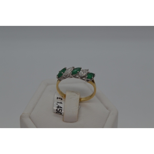 172 - 18ct yellow gold marquise cut five stone emerald and diamond ring. Approx  E0.75ct, D0.50ct. Hallmar... 