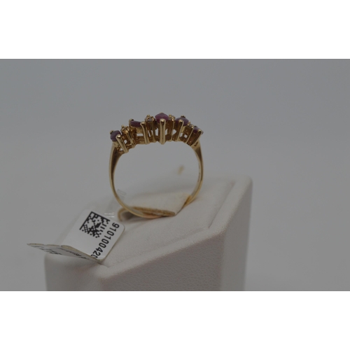 177 - A 14ct yellow gold ring in a wishbone design featuring marquise pink stone and diamonds, stamped 14k... 