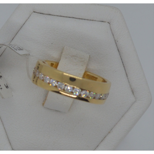 186 - 18ct Yellow gold diamond band, marked 18K 0.75ct, approx size J, approx weight 5g, This item has bee... 