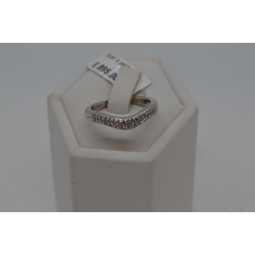 192 - Platinum and diamond ring featuring a double row of diamonds,  approx 0.30ct, approx size M.  Hallma... 