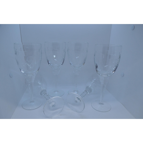 24 - A set of 6 Waterford crystal Geo pattern  wine glasses with crest, etched John Rocha Waterford to ba... 