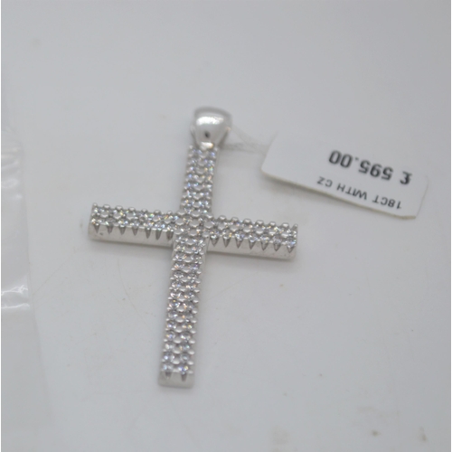 38 - 18ct white gold CZ cross pendant, stamped 750 289VI. This item has been consigned from liquidated hi... 