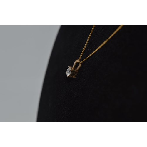 39 - Yellow gold necklace with 0.33ct diamond solitaire pendant marked as 9ct gold