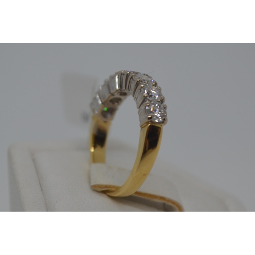 83 - 18k yellow gold and 1.40ct seven stone half eternity diamond ring. Approx gross weight 4g, approx si... 