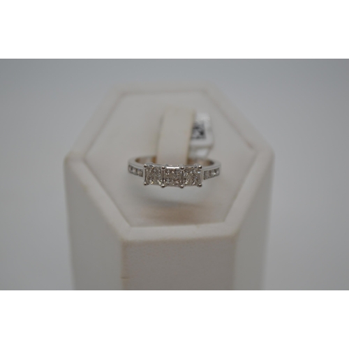 197 - 18ct white gold diamond ring in square from central design with x6 accent diamonds to shoulder, tota... 