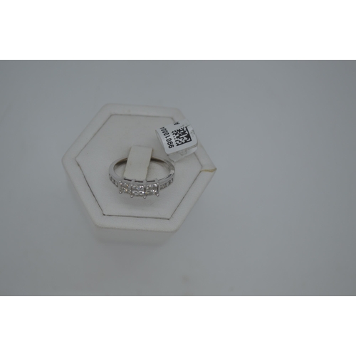 197 - 18ct white gold diamond ring in square from central design with x6 accent diamonds to shoulder, tota... 