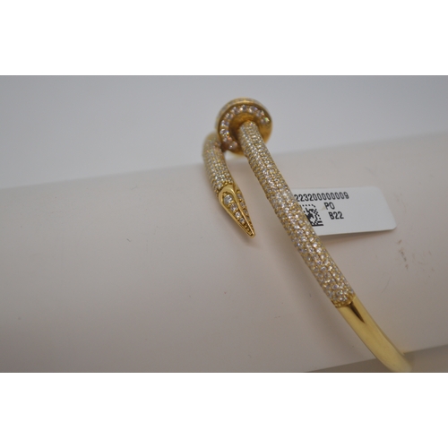 145 - 18ct yellow gold hinged bracelet featuring approx 3.75ct diamonds set into the bangle, approx gross ... 