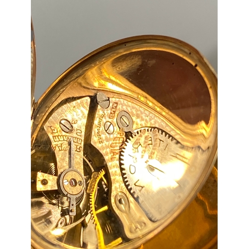 153 - A 9ct gold half-hunter pocket watch, the  case hallmarked for A.L.D 323999, hallmark Birmingham 1925... 