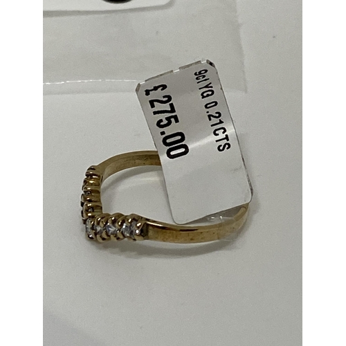 176 - 9ct Yellow gold seven stone diamond wishbone ring, approx size m, approx 0.21ct, hallmarked 375.  Th... 