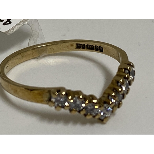 176 - 9ct Yellow gold seven stone diamond wishbone ring, approx size m, approx 0.21ct, hallmarked 375.  Th... 