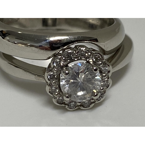 191 - Platinum two-piece diamond cluster ring and interlocking band set, central stone in raised claw sett... 