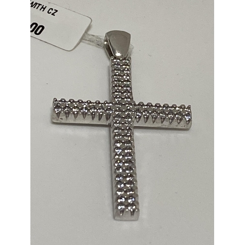 38 - 18ct white gold CZ cross pendant, stamped 750 289VI. This item has been consigned from liquidated hi... 