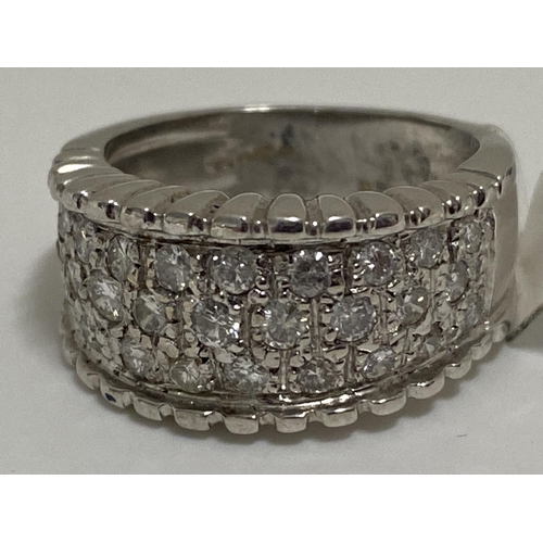 76 - 18 ct white gold 1ct diamond ring consisting of three rows of diamonds set into the thick band, hall... 