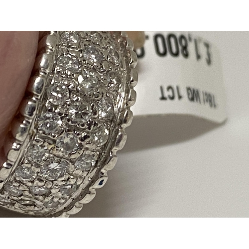 76 - 18 ct white gold 1ct diamond ring consisting of three rows of diamonds set into the thick band, hall... 