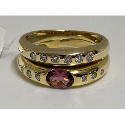 79 - 18ct yellow gold double band ring with diamonds set into both bands with central pink oval stone. Ap... 