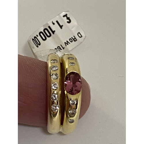 79 - 18ct yellow gold double band ring with diamonds set into both bands with central pink oval stone. Ap... 