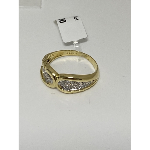 81 - 18ct gold 0.60ct diamond ring in a bow design.  Hallmarked 750 London.  Approx sie o, approx weight ... 