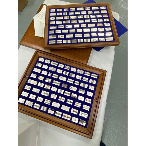 271 - John Pinches Limited – Display chest containing ‘The Flags of the United Nations’ full two drawer si... 