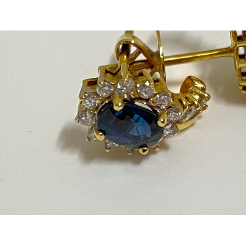 149 - A pair of 18ct yellow gold sapphire and diamond cluster earrings, approx gross s1ct, d0.60. Unmarked... 