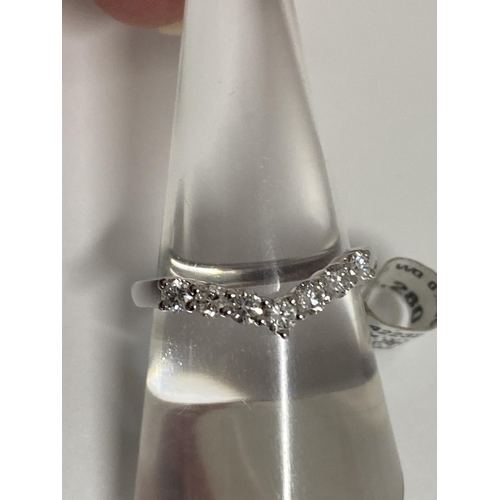 173 - Platinum diamond wishbone ring,  approx size N, approx gross weight 4g.This item has been consigned ... 