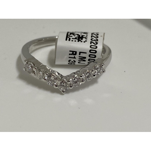 173 - Platinum diamond wishbone ring,  approx size N, approx gross weight 4g.This item has been consigned ... 