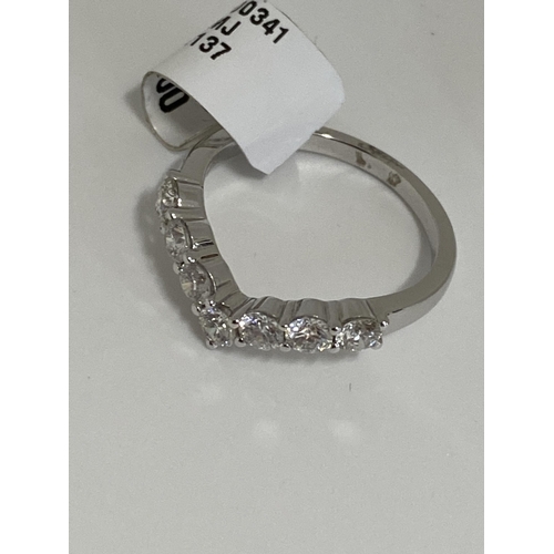 174 - 18ct white gold 0.50ct diamond wishbone ring, approx size M. This item has been consigned from liqui... 