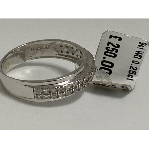 194 - 9ct white gold ring featuring 0.25ct twin row of diamonds. Approx size l,  stamped 375, This item ha... 