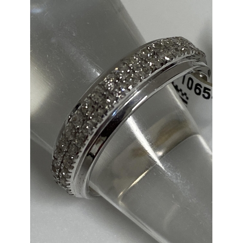 194 - 9ct white gold ring featuring 0.25ct twin row of diamonds. Approx size l,  stamped 375, This item ha... 