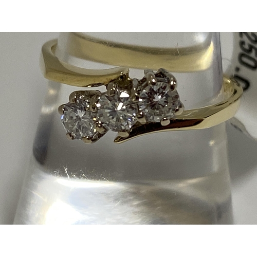 200 - 18k yellow gold 0.60ct diamond ring featuring three diamonds in an unusual design. Hallmarked 750 Lo... 