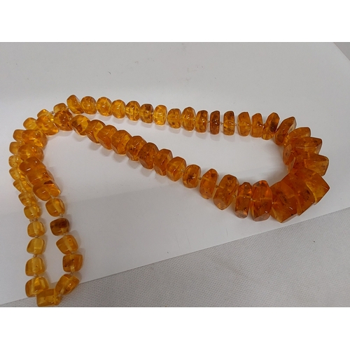 57 - Chunky graduated amber necklace, approx gross weight 195g