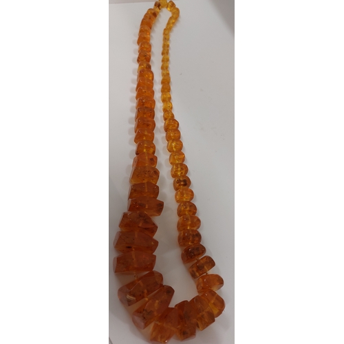 57 - Chunky graduated amber necklace, approx gross weight 195g