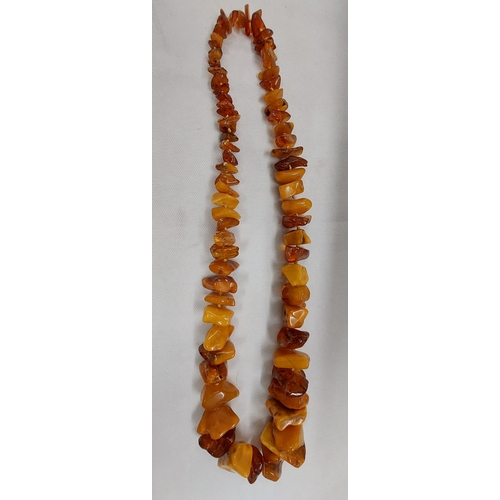 59 - Individually strung/knotted graduated amber necklace approx gross weight 180grams