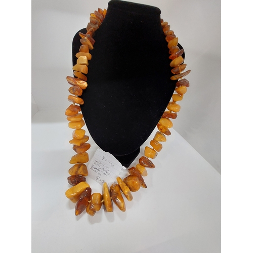 59 - Individually strung/knotted graduated amber necklace approx gross weight 180grams