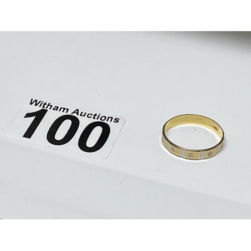 100 - White and yellow gold band ring with screw head design, approx size V, stamped 750, approx 2g