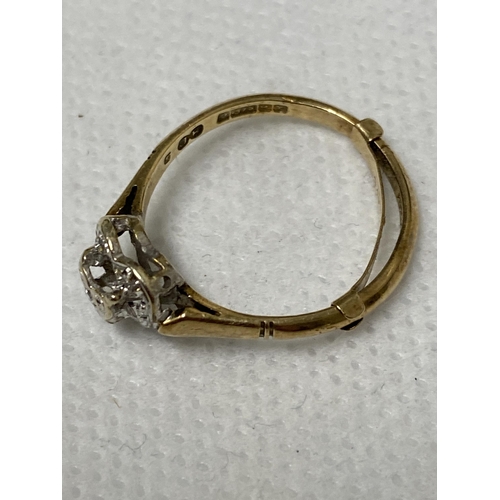 104 - A 9ct yellow gold heart shaped ring, outer layer of diamonds with raised central stone in heart shap... 